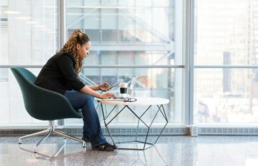 Women sitting at a table with laptop